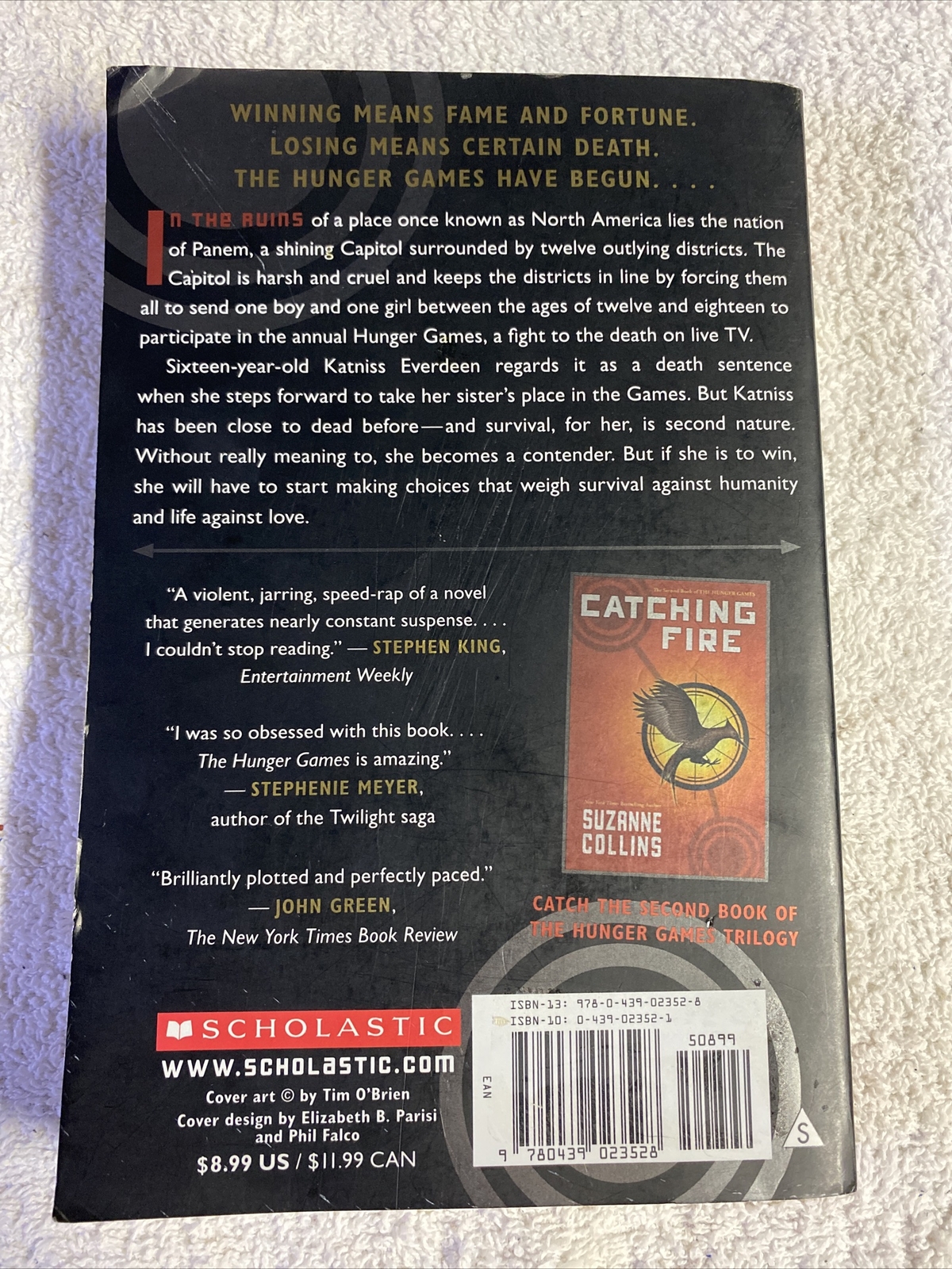 The Hunger Games (Book 1) – Paperback By Suzanne Collins – GOOD