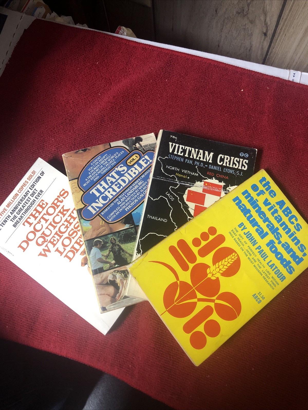 4 Expensive Mass Market Paperback Books ABC’s Of Vitamins , Vietnam Crisis, More